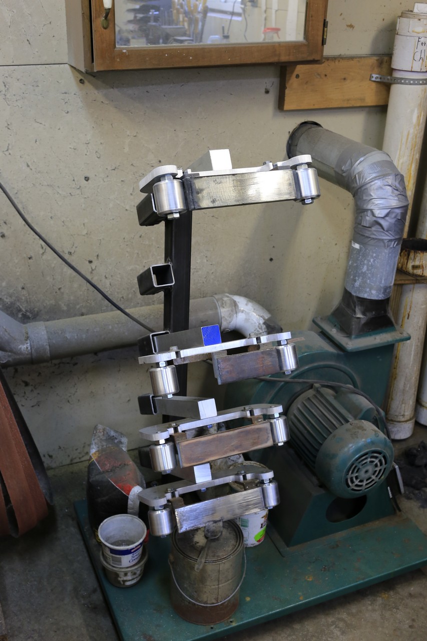 Grinder tooling arm storage?
